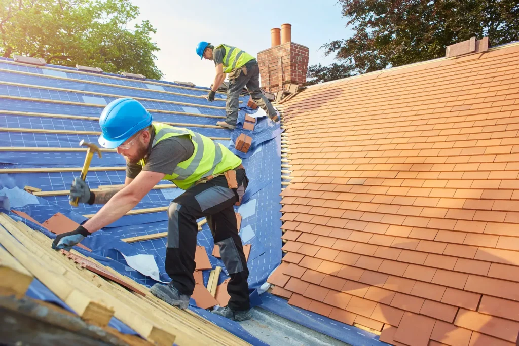 men repairing roofs