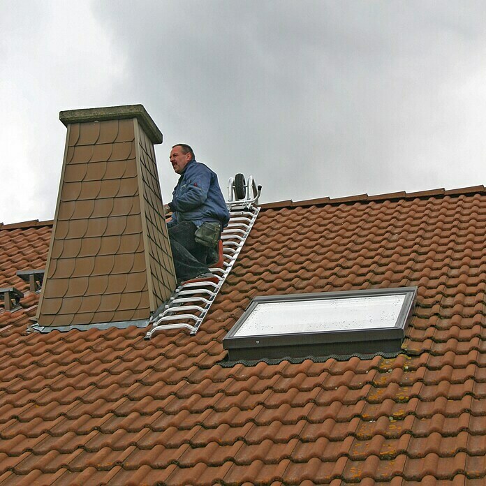 man sitting on roof