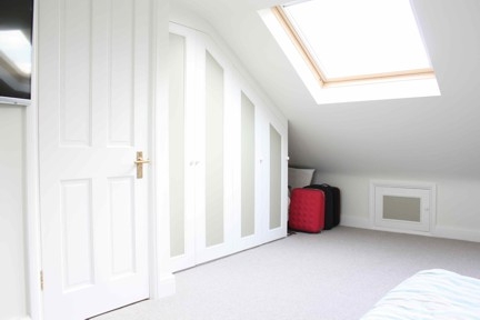 What are the benefits of a loft conversion in Ealing?