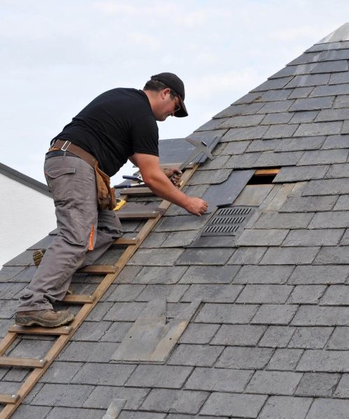 Man repairing the roof